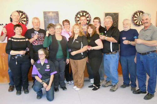 Dart competitors at the Arden Legion's roof share fundraiser on April 6